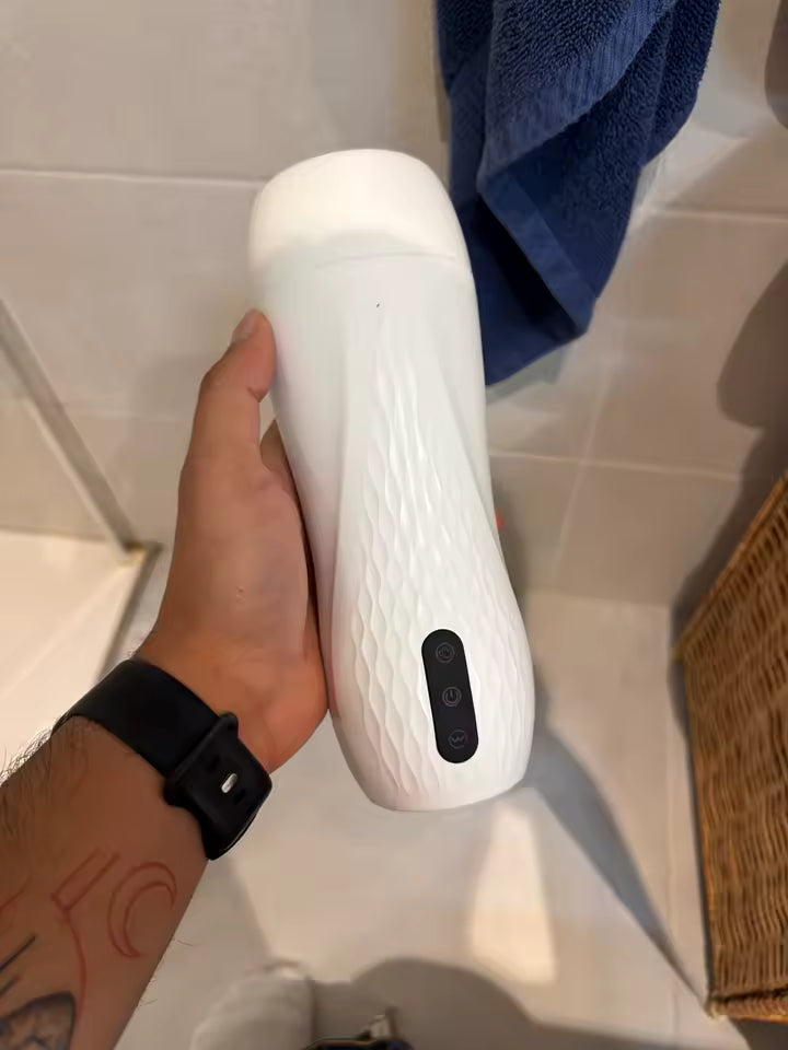 Menvara EREC device held in hand, true to scale