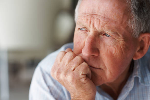 Man lost in thought about relationship strain